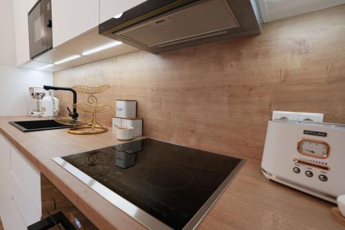 Η κουζίνα ή μικρή κουζίνα στο "Carl's Design Residences" - Your family-friendly, urban & stylish Oasis in Vienna l free parking & great access