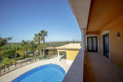 a view of a house with a swimming pool at Quinta do Sol in Guia