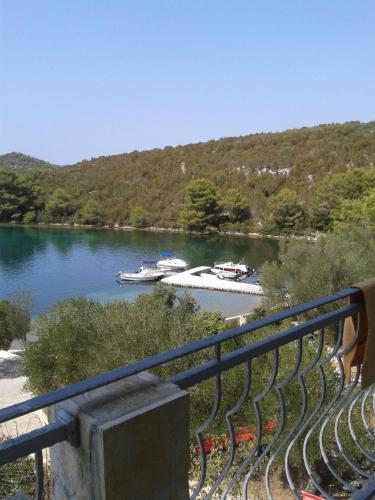 a view of a river with boats in the water at Zimmer in Luka mit Meerblick, Balkon, Klimaanlage, W-LAN 4659-3 in Luka