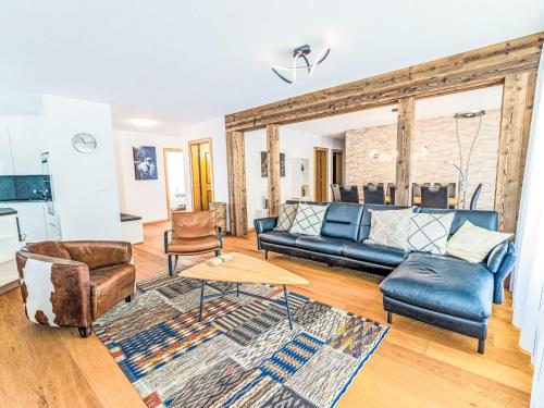 a living room with a couch and chairs at Apartment B21 by Interhome in Leukerbad