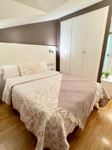 Ένα ή περισσότερα κρεβάτια σε δωμάτιο στο Hotel El Acebo