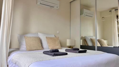 Katil atau katil-katil dalam bilik di L'Azur - Apt de Standing - Piscine - Parking