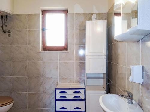 Ένα μπάνιο στο Holiday Home Mara by Interhome