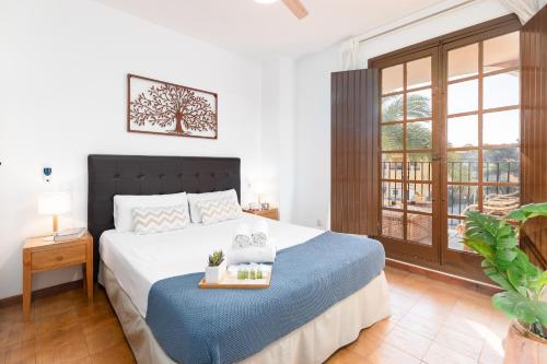 Ένα ή περισσότερα κρεβάτια σε δωμάτιο στο Travel Habitat Casa con embarcadero.