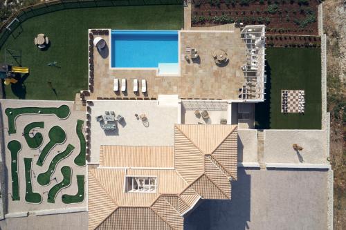 Πισίνα στο ή κοντά στο Karousa Villa - Karousa Villas Anafonitria Zakynthos