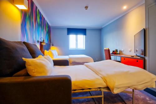 Letto o letti in una camera di Village Hotel Hull