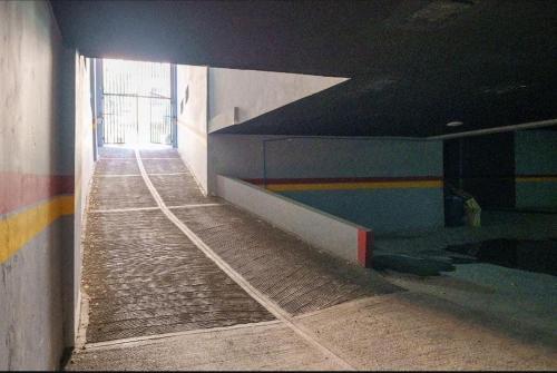 a hallway in a building with a stairway at Élégance urbaine, Gueliz central in Marrakech