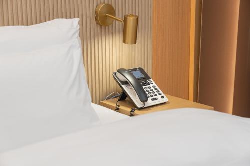 Postel nebo postele na pokoji v ubytování Hotel YAJA Namchuncheon