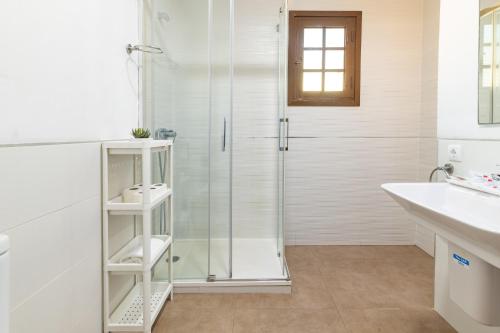 Ένα μπάνιο στο Travel Habitat Casa con embarcadero.