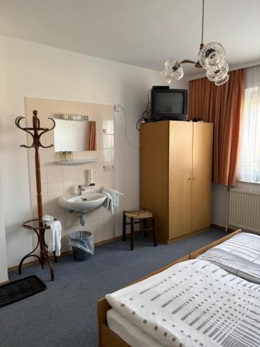 Postel nebo postele na pokoji v ubytování Pension Eicher