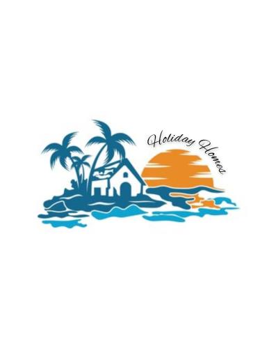 a house on an island with palm trees and a sunset at holiday homes in Murud