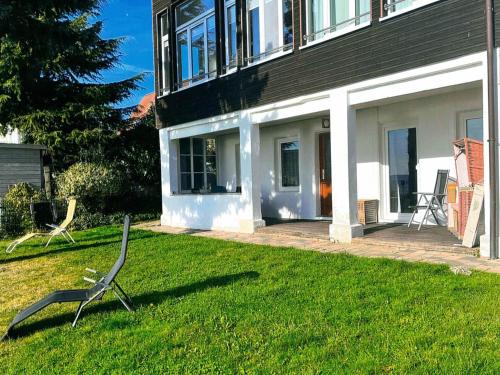 Aed väljaspool majutusasutust Ferienwohnung Ostseeheim - 1 Reihe mit Meerblick