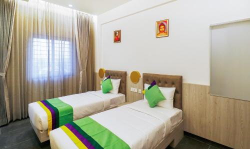 Postel nebo postele na pokoji v ubytování Itsy Hotels Silver Keys