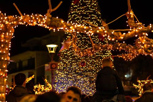 a group of people standing in front of lights at SOTIRIA APARTMENT in Kiáton
