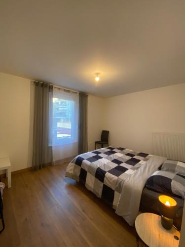 Postel nebo postele na pokoji v ubytování City trip Strasbourg