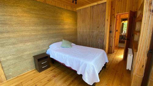 Katil atau katil-katil dalam bilik di Casa Isla El Pangal Pichilemu