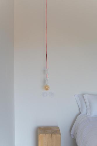 Postel nebo postele na pokoji v ubytování Alàpega, Live Slow