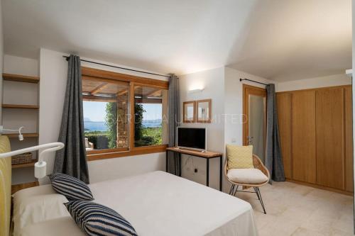 Ένα ή περισσότερα κρεβάτια σε δωμάτιο στο Villa Jaqueline