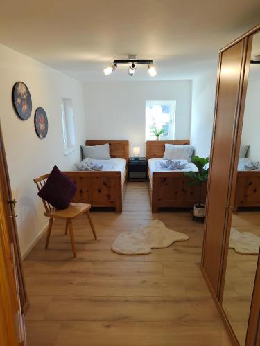Postel nebo postele na pokoji v ubytování Steuerberg Lodge -Ski