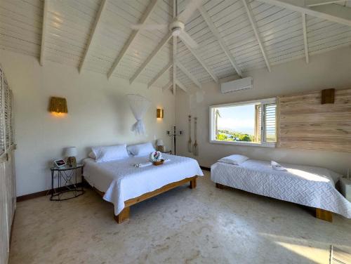 Una cama o camas en una habitación de JandalaVillage