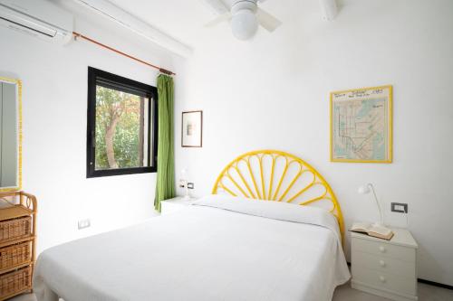 Ένα ή περισσότερα κρεβάτια σε δωμάτιο στο Caletta Nest 108