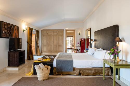 Ένα ή περισσότερα κρεβάτια σε δωμάτιο στο Son Julia Country House & Spa