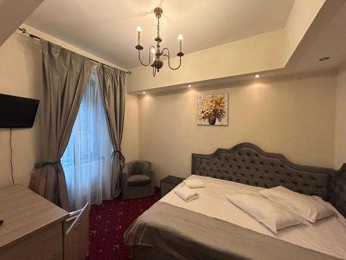 TV a/nebo společenská místnost v ubytování Hotel Stavilar
