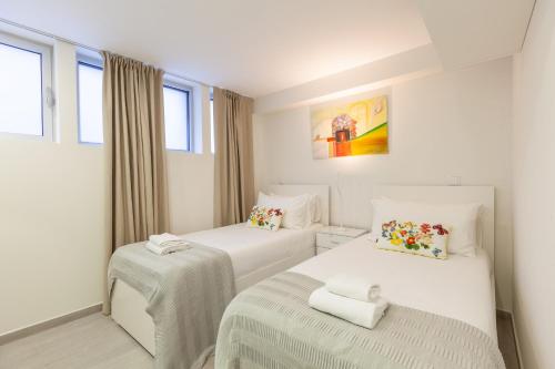 Ένα ή περισσότερα κρεβάτια σε δωμάτιο στο D&S - Torne Apartments