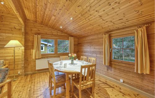 a dining room with a table and chairs at 2 Bedroom Nice Home In Masserberg in Masserberg