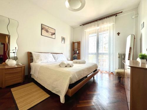 Ένα ή περισσότερα κρεβάτια σε δωμάτιο στο La casa degli archi