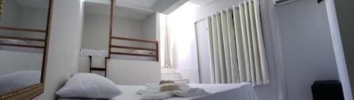 Katil atau katil-katil dalam bilik di Pousada Terral - Broadway em Canoa Quebrada