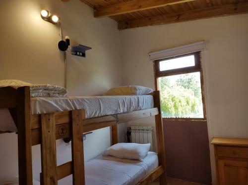 Llit o llits en una habitació de Hostel Yatel