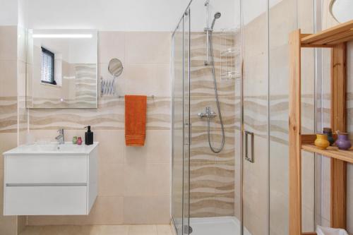 a bathroom with a shower and a sink at Apartment Zeza in Albufeira
