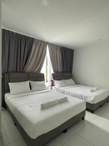 Voodi või voodid majutusasutuse TDOZE Hotel toas