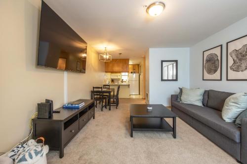 a living room with a couch and a table at 04 Lodge in Hood River