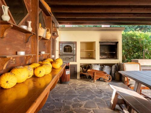 a kitchen with a counter with some food on it at Holiday Home Rosa by Interhome in Pian dʼAlma