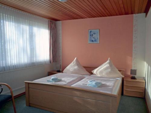 Cama o camas de una habitación en Am Alten Hafen