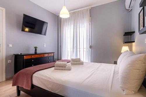 Postel nebo postele na pokoji v ubytování Seren- Coastal Road Apartment