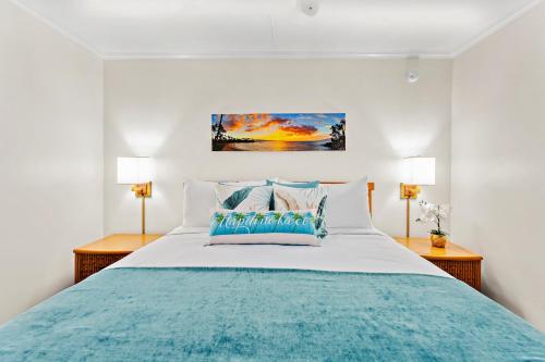 Ένα ή περισσότερα κρεβάτια σε δωμάτιο στο Napili Shores E135