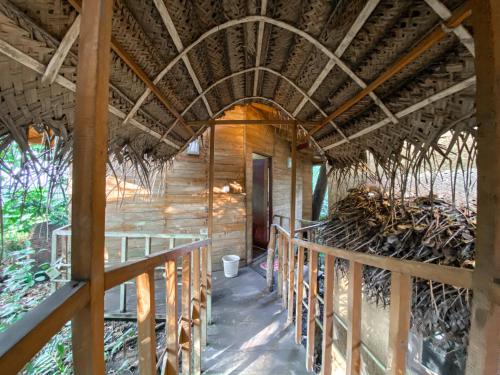 an inside view of a house under construction at Seasons Four Eco Friendly Treehouse in Matara