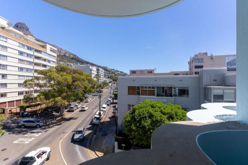a view of a city street with cars parked at The Tropicana Hotel in Cape Town