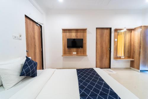 Ένα ή περισσότερα κρεβάτια σε δωμάτιο στο Strawberry King Resort