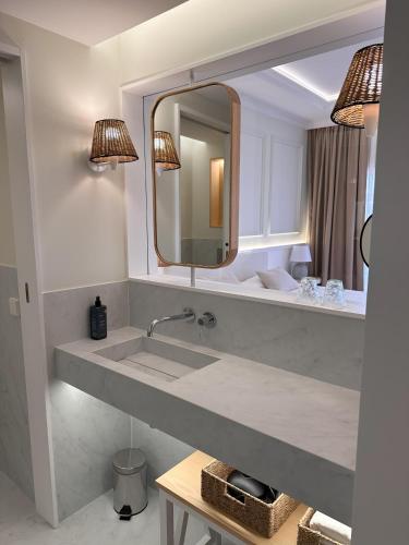 a bathroom with a sink and a mirror at Bordoy Don Antonio in Paguera