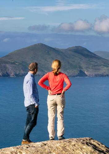 a man and a woman standing on top of a mountain at Valentia Island Escape in Valentia Island