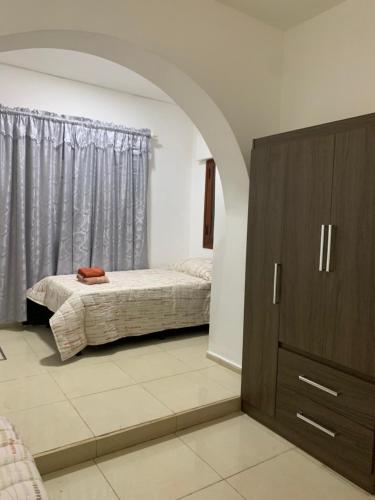 Postel nebo postele na pokoji v ubytování Cuatro reinas