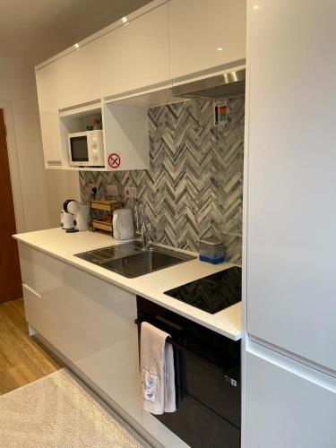 Una cocina o zona de cocina en Nice flat for stay in and rest