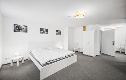Ένα ή περισσότερα κρεβάτια σε δωμάτιο στο Fachwerkstudio 1 Lausitzer See