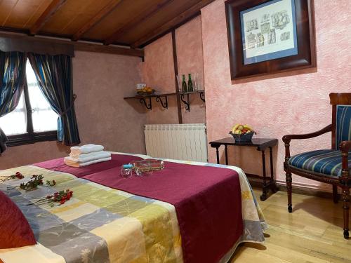 Postel nebo postele na pokoji v ubytování La Posada del Hidalgo de Alarcón