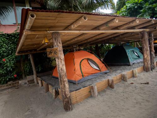 Фотография из галереи La Casa Mompiche Camping & Dorm в городе Момпиче