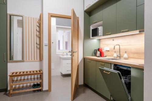 Kuchyňa alebo kuchynka v ubytovaní Seifertova Apartments by Willstay